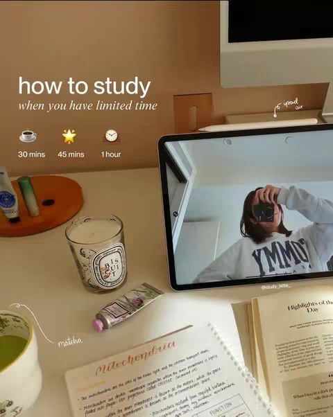 A cover image of a study setup with a tablet displaying someone taking a photo. On the table are study materials, a candle, and a cup of matcha.