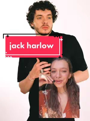 The cover image features a split composition. On the top, a large image of Jack Harlow is seen against a white background. He has dark curly hair, and is wearing a black t-shirt. Below, on the lower right, a woman with long hair and a floral shirt is partially visible, with a microphone in front of her mouth. A red banner with white text that reads 'jack harlow' is overlayed on the image of Jack Harlow.