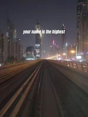 The cover image showcases an urban cityscape at night, featuring tall, illuminated buildings with a prominent central tower. Tracks run into the distance, with text overlayed in the center.