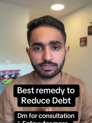 A man with dark hair and a beard is centered in a selfie-style shot. Text boxes overlay his face, and the background is a blurred, neutral-toned room.
