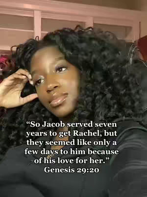 A close-up shot of a Black woman with long, curly black hair. She's looking slightly upward with a thoughtful expression. Text overlaid on the image features a Bible verse about Jacob and Rachel.