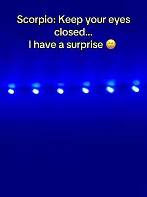 The cover image is a vertical composition with a deep blue background. At the top, there is white text. Below a line of small glowing blue lights is arrayed horizontally across the center. The overall aesthetic is simple and clean, with the text providing the primary focus.