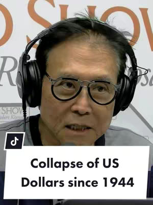 A man wearing glasses and headphones looks toward the viewer with a serious expression. The background is slightly out of focus, with text visible. A white bar at the bottom of the image displays the text overlay.