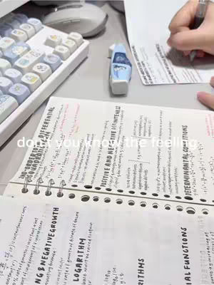 The cover image shows a workstation with a keyboard, a pen, a highlighter, and a notebook filled with handwritten notes. The text overlay states 'don't you know the feeling'.