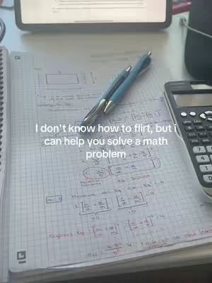 The image shows a notebook with math equations, two pens, and a calculator on a desk or table. The notebook is open to a page filled with handwritten equations and diagrams. A pen lies across the notebook, and to the right, a calculator is visible. The background shows a part of a laptop. Overlayed on the image is the text 'I don't know how to flirt, but I can help you solve a math problem'. The color palette is muted, with a focus on the white and gray pages and dark pens and calculator.