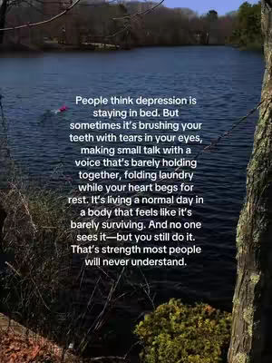 The image shows a lake scene with a blurry background of trees. Text overlays are present, conveying a message about mental health and depression. The overall colors are natural with the blue water and the foliage, and a pink dot appears, presumably a buoy or other object in the lake. The image is composed in a way to provide depth and a sense of calmness despite the heavy content.