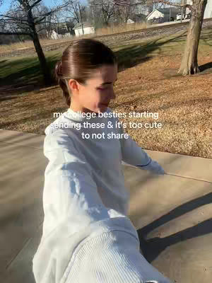 A woman with brown hair in a ponytail walks forward on a sidewalk, with a park next to her. The text overlay says, my college besties starting sending these & it's too cute to not share