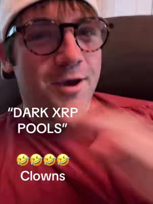 A man wearing glasses and a white cap looks directly at the camera and gestures with his right hand. Text overlays read "DARK XRP POOLS," followed by laughing face emojis and the word "Clowns."