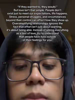 A close-up shot of a person's face wearing glasses and a dark hoodie, with overlaid text discussing the complexities of love and relationships.