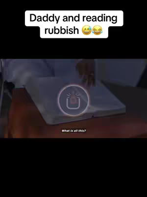 The image shows a person from the chest down in a seated position, holding a thick, open book. The person is wearing a white shirt. On the book, there is a superimposed icon that looks like a play button. Above the book, a text overlay reads "Daddy and reading rubbish" with laughing emojis. A speech box in a lower corner says, "What is all this?" The image is in muted colors, mostly blues and browns, with a dark background.