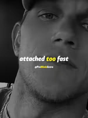 A grayscale close-up of a man's face. The top part of his head is in the frame, with a dark cap. The text overlay 'attached too fast' is in white, with a yellow highlight, and the username '@ProMindsExtra' is below in smaller text.