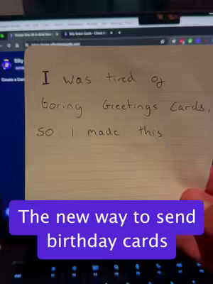 A handwritten note on a notepad is held in front of a laptop screen. The note, written in black ink, states "I was tired of boring Greetings Cards, so I made this." Below the note is a purple banner with white text that reads "The new way to send birthday cards". The background includes a blurred laptop screen displaying a website.