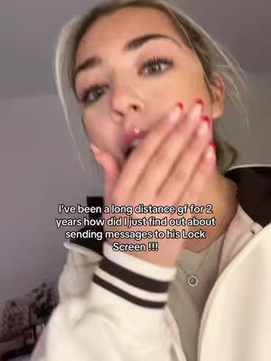 A close-up shot of a young woman with blonde hair looking towards the camera, her expression suggesting strong emotion. She is wearing a white top with a black stripe, and her hand is raised to her face, partially obscuring her mouth. Text overlays are visible with the explanation of the video purpose.