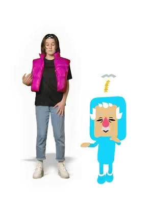 A person stands in front of a white background, with an animated cartoon avatar next to them. The person wears a black T-shirt, blue jeans, white sneakers, and a shiny pink vest. A black headband is in their hair. The avatar is blue, with thick white eyebrows and white hair. It's wearing a square shaped face with small eyes and a red nose.