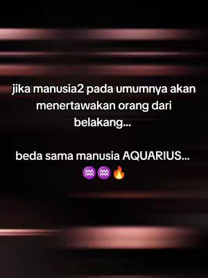 A dark, blurred background transitions from shades of brown and black. Superimposed on this is a text overlay in white, featuring a statement about how Aquarius people differ from others, which is followed by the Aquarius symbol and a fire emoji. The layout is clean, with the text centered.