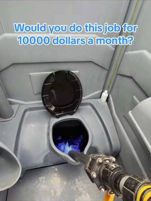 The image shows the inside of a public restroom, with a black toilet seat cover in the upper center and a nozzle pointing into the toilet from the lower right. The text overlay says: Would you do this job for 10000 dollars a month?