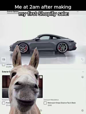 The image features a Donkey's face in the foreground with a car and a UI in the background with overlay text. The donkey is looking directly at the viewer. Above the car is white text.