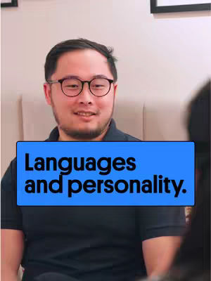 A man with glasses is centered in the frame, smiling slightly, with a blue banner across the bottom of the image. The banner has the text 'Languages and personality' in white.