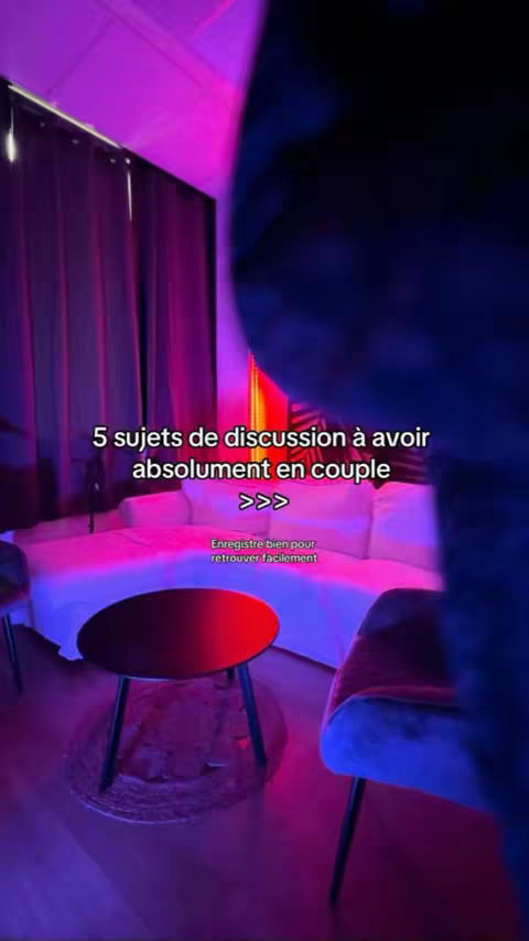 The image shows a room with a sofa, a small table, and two chairs, all bathed in blue and purple light with text overlayed.