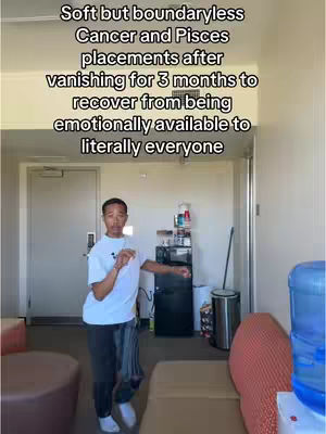 A young man stands in an apartment, gesturing with his hand. Text overlays describe astrological concepts.
