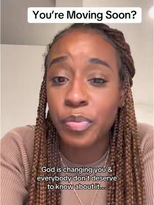 The cover image is a selfie-style shot of a woman with long, braided hair. She is positioned with her face centered, looking at the camera. Above her head is a text box that reads 'You're Moving Soon?'. Below her, superimposed over the image, is the text 'God is changing you & everybody don't deserve to know about it....'