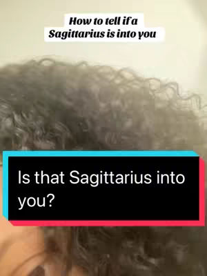 The cover image shows a close-up of a person, with a focus on their hair. Overlaid on the top of the image is text that reads, "How to tell if a Sagittarius is into you". There is also a rectangular box at the bottom of the image with a color gradient and the text, "Is that Sagittarius into you?". The background is out of focus.