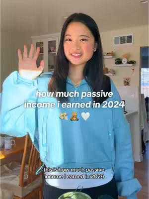 A young woman stands indoors, smiling and holding up her hand. The image is well-lit, with a soft background and clear text overlay.