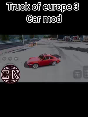 The cover image shows a red car modded in a game environment. The car is parked on a gray surface, with a road visible in the background. The image has a black upper portion with white text overlay and a logo at the lower section.