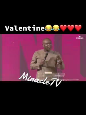 A man in a suit is seen speaking on a stage with a microphone. Above the man, the text 'Valentine' along with emojis of laughing faces and hearts adorn the image, suggesting the video's theme.