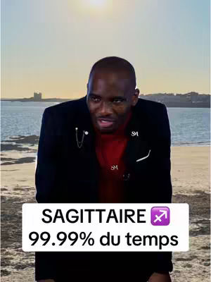 A man in a black blazer and red shirt is standing on a beach with the ocean and a sunlit sky in the background. A text box at the bottom of the image reads "SAGITTAIRE" and "99.99% du temps" and the Sagittarius zodiac symbol.