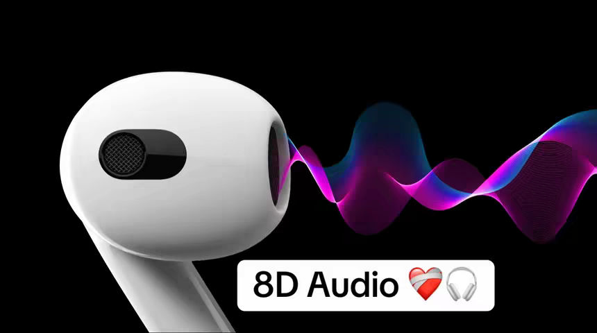 The image features a white earbud from a side angle, dominant in the center, set against a black background. To the right of the earbud, flowing, multi-colored lines in pink, blue, and purple suggest sound waves. Below the earbud, a white rectangular box displays the words "8D Audio" in a white bold sans-serif font, complemented by a red heart emoji and an image of headphones.