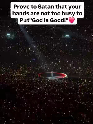 The cover image shows a large event, likely a concert or religious gathering. A bright stage or platform, circled in red, stands out in the center, with a figure on it. The crowd, a sea of tiny lights, fills the surrounding darkness, emphasizing the vastness of the space. Above the scene, a text overlay suggests the video's focus is religious.