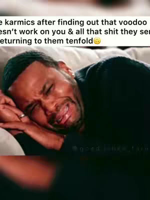 A close-up shot captures a Black man with a pained facial expression. His eyes are squeezed shut, his mouth is contorted as if he's about to cry, and he has tears in his eyes. The image has a film-like quality, with a slightly blurred background. The man's skin appears smooth, and the lighting seems natural.