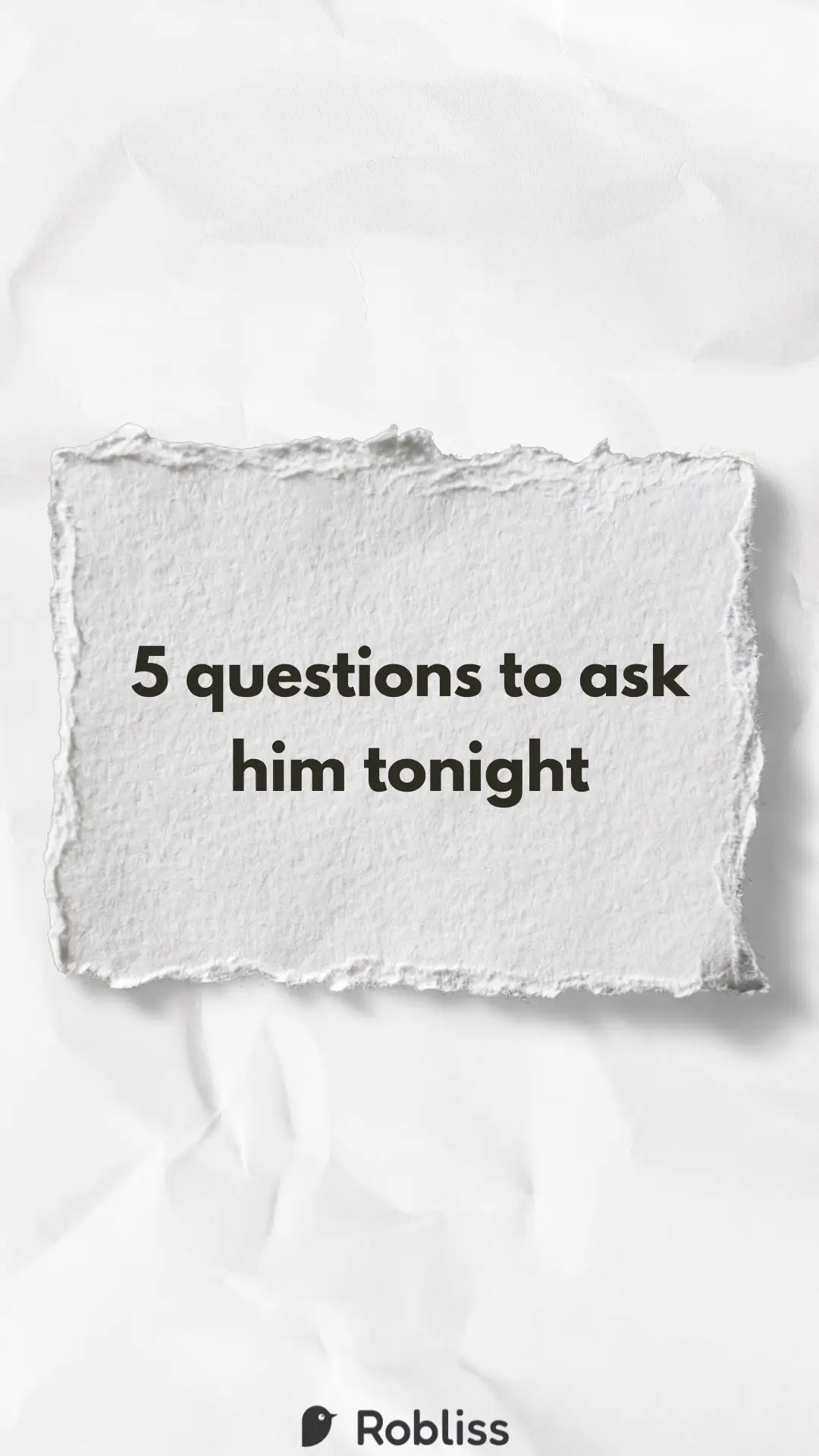 A white paper texture background dominates the image, creased and crumpled. A rectangular piece of textured, off-white paper is superimposed. It has rough, torn edges and contains black text.