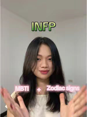 A young woman with long dark hair and fair skin looks towards the camera, smiling slightly. The background is a plain, bright wall. Text overlays are present: “INFP” in green at the top, and “MBTI” and “+” and “Zodiac signs” in pink towards the bottom.