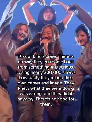 A group of young women, presumably a pop group, is the focus. They are on stage with bright blue lights and a background of a concert backdrop. The faces express varied emotions, some smiling and others looking emotional. Text overlay has been applied to the image.