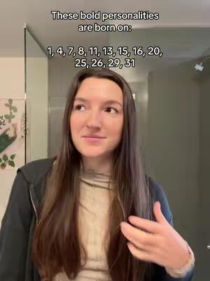 A woman with long brown hair smiles while looking slightly off-camera. Text overlays, including a list of numbers, appear over her. The background includes a mirror, creating depth, and a neutral-colored wall.