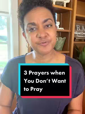 A woman with short, dark hair and hoop earrings is centered in the frame. She's positioned in front of a light-colored wall and a wooden shelf unit, part of the background. A teal and red rectangle is overlaid, containing white text, which appears to be the title of the video.