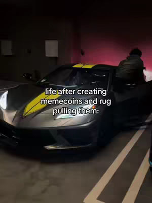 An exterior shot of a dark gray sports car with yellow stripes on its hood, parked in a dimly lit garage. A person is visible getting out of the car.