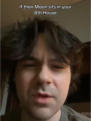 A medium shot features a light-skinned man with dark hair and a neutral expression looking towards the viewer. The top text overlay reads, "If their Moon sits in your 8th House."