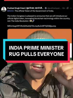 A selfie-style video cover with a man centered, speaking. Overlayed are text blocks about a cryptocurrency rug pull, positioned above the man's face, obscuring part of the video frame, which includes additional text describing the India's official digital token.