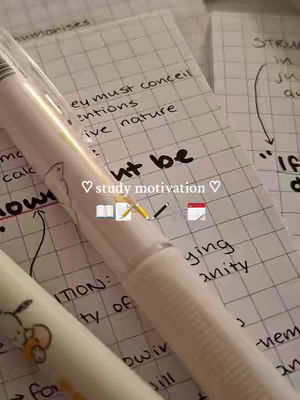 A close-up shot of a study setup with a pen and handwritten notes. The notes have a gridded background, and a pen is positioned over the notes, with a few other pens visible in the frame. Overlayed text and icons are added to the image.