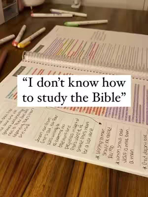 The image showcases an open notebook or Bible study guide on a wooden surface, surrounded by colorful pens and pencils. The focus is on a study session with the text overlay.
