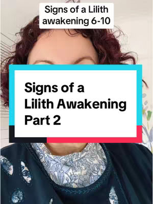 The cover image is a selfie-style shot with a woman's face filling most of the frame. The woman has fair skin, red-toned curly hair, and is looking directly at the camera. A teal box is overlaid in the mid-section, and has the text "Signs of a Lilith Awakening Part 2" in bold, white font. The background includes a glimpse of a light-colored wall with a floral pattern. The woman wears a dark-colored top.