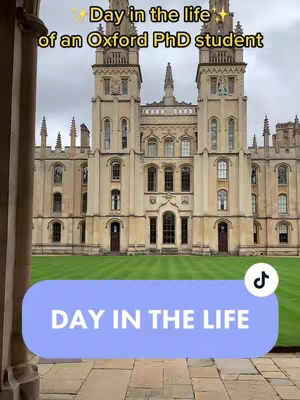 The image shows a view of a large, ornate building framed by archways, with the words 'Day in the life of an Oxford PhD student' and a blue rounded rectangle that contains the words 'DAY IN THE LIFE' in white, with a musical note icon. The scene is outdoors, with a cloudy sky above and green grass below.