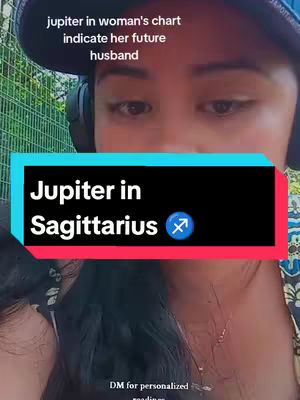 The cover image features a person wearing a dark baseball cap and headphones, with a blurred background. Overlayed on the image is a rectangular box with the text \"Jupiter in Sagittarius\" and a Sagittarius zodiac symbol. Additional text indicates that the video's topic is astrology.