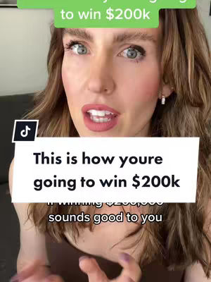 A medium shot features a woman with long wavy hair, looking directly at the camera with an open mouth. She is wearing makeup and a brown top and the background is out of focus. Overlaid on the image are text boxes with the video's hook.