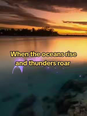 A serene landscape features a body of water reflecting a vibrant sunset with orange and yellow hues. The water is calm, and the sky is filled with clouds. Text overlayed on the image reads: When the oceans rise and thunders roar.