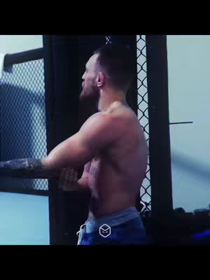 The cover image showcases a man working out in what appears to be a gym or training facility. The man is shirtless, with his back to the camera, indicating his muscular physique. He is reaching for something in the background. The layout is simple, with the man as the central figure, and the overall composition is focused on portraying strength and physical exertion.