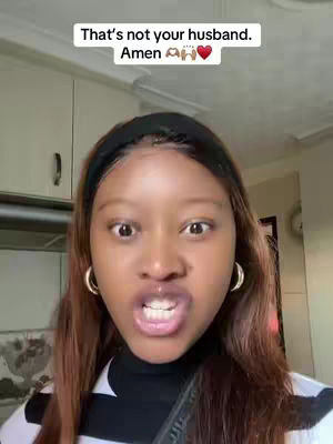 A close-up of a woman looking directly at the camera with a surprised expression. She has brown hair pulled back with a black headband and gold hoop earrings. The background is blurred, appearing to be a kitchen with white cabinets. Text overlays appear at the top.